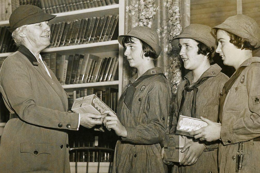 Lou Hoover the new president of the Girl Scouts buys the first box of cookies. 11/14/1935