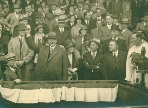 President Herbert Hoover throws out the first pitch of the season