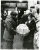 In Paris, before soldiers returned to the United States they would shop for souvenirs. The lampshade in this picture was make by Belgians from the flour sacks that were sent to them by the Belgian Relief Committee. 