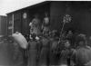 Soldiers of the Soviet army guarding trainloads of American corn arriving in Simbirsk, Russia. 43 cars in all, April 1922