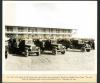 Prior to cold weather the swing shift leaves for work in open air buses. 11/07/1931