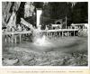 Dumping materials at temporary pile bridge to complete diversion of the Colorado River. 11/13/1932