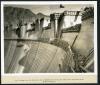 Looking across the downstream face of Boulder Dam, showing utility towers and elevator shaft. 01/28/1935