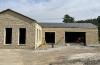 Exterior view of new expanded lobby area, front entrance, and bay window, August 6, 2025