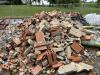 Pile of bricks and limestone rubble from chimney removal