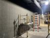 New wall covering being installed in Temporary Exhibit gallery, February 24, 2026