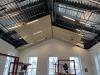 Installation of ceiling panels and lighting in new Lobby expansion, March 4, 2026