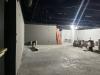 Wall covering being installed in Temporary Exhibit gallery, March 9, 2026