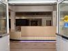 View of reception desk from new front entrance, April 22, 2026