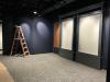 Installing framework in new "Uncommon Iowans" gallery, April 29, 2026