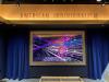 Video screen for the new "American Individualism" mini theater, May 6, 2026