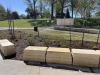 Newly planted trees and grass adorn the spaces in front of the Museum, May 13, 2026