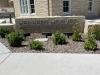Landscaping around the new Library sign, July 15, 2026