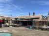 Work crew installing roof insulation, July 2, 2025