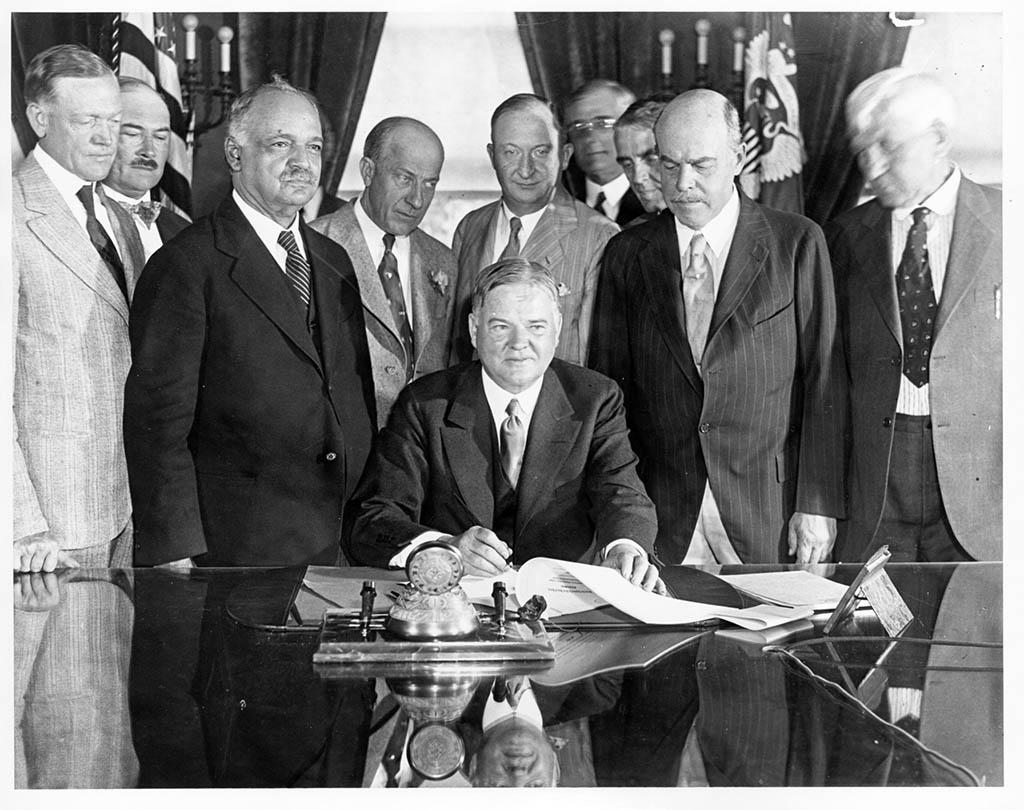 06/15/1929 President Hoover signs Farm Relief bill.