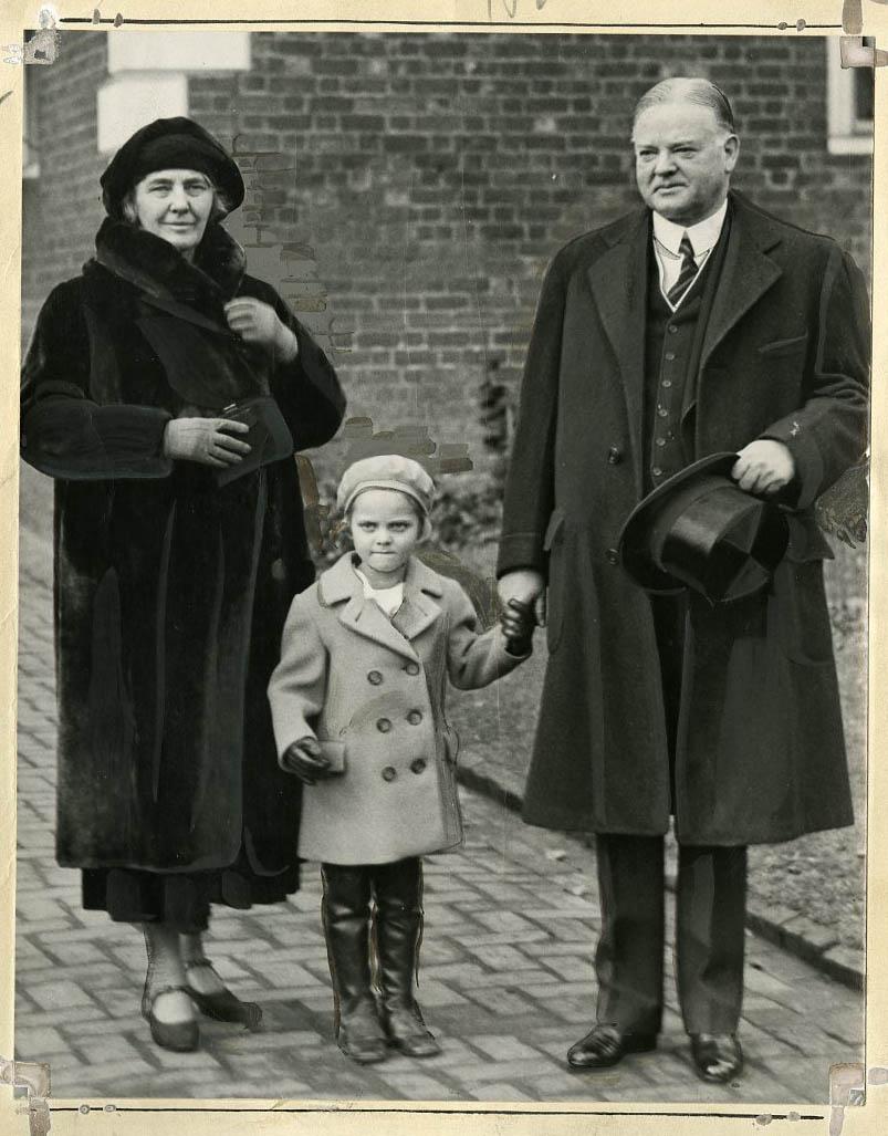 President Hoover and wife Lou with their granddaughter. 1931