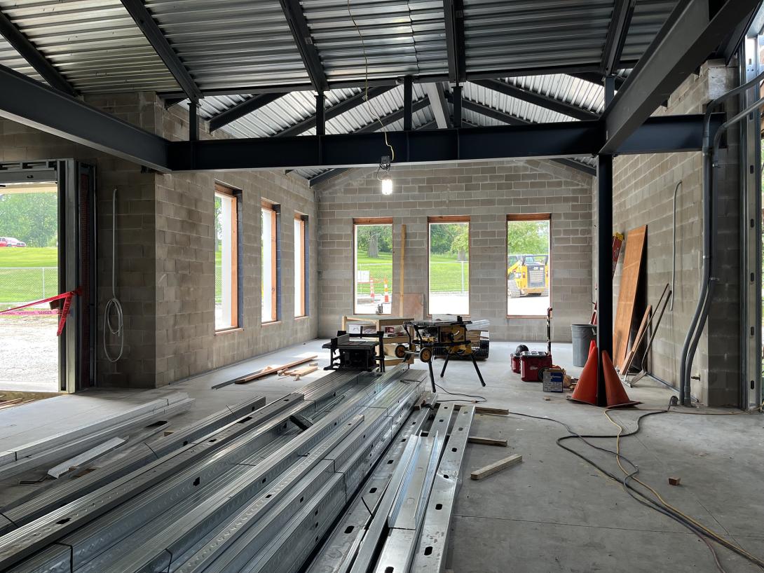 Interior view of new expanded lobby area with new concrete floor, August 6, 2025