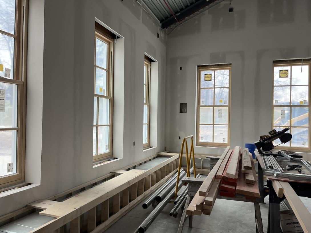 Installation of benches in the new expanded lobby area, November 26, 2025