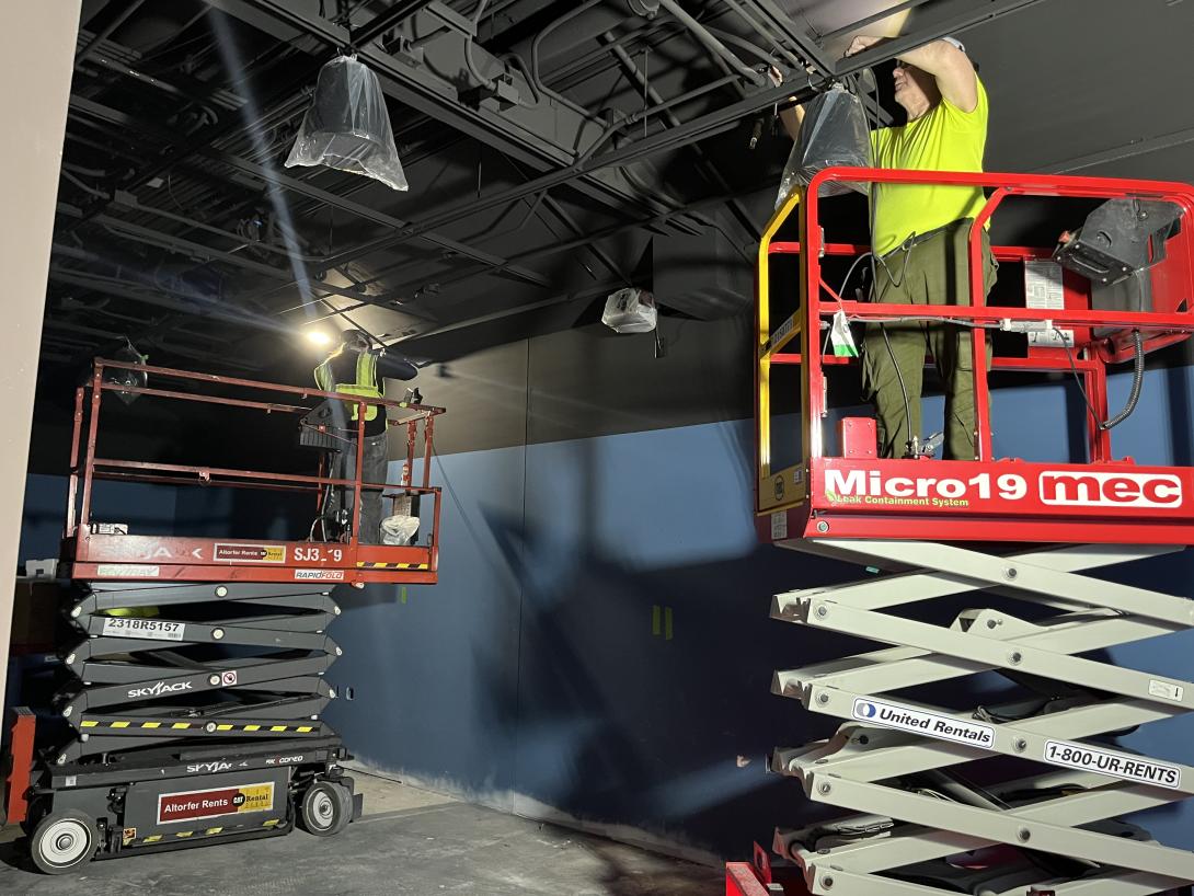 Workers install sound cones in new Museum gallery, February 4, 2026