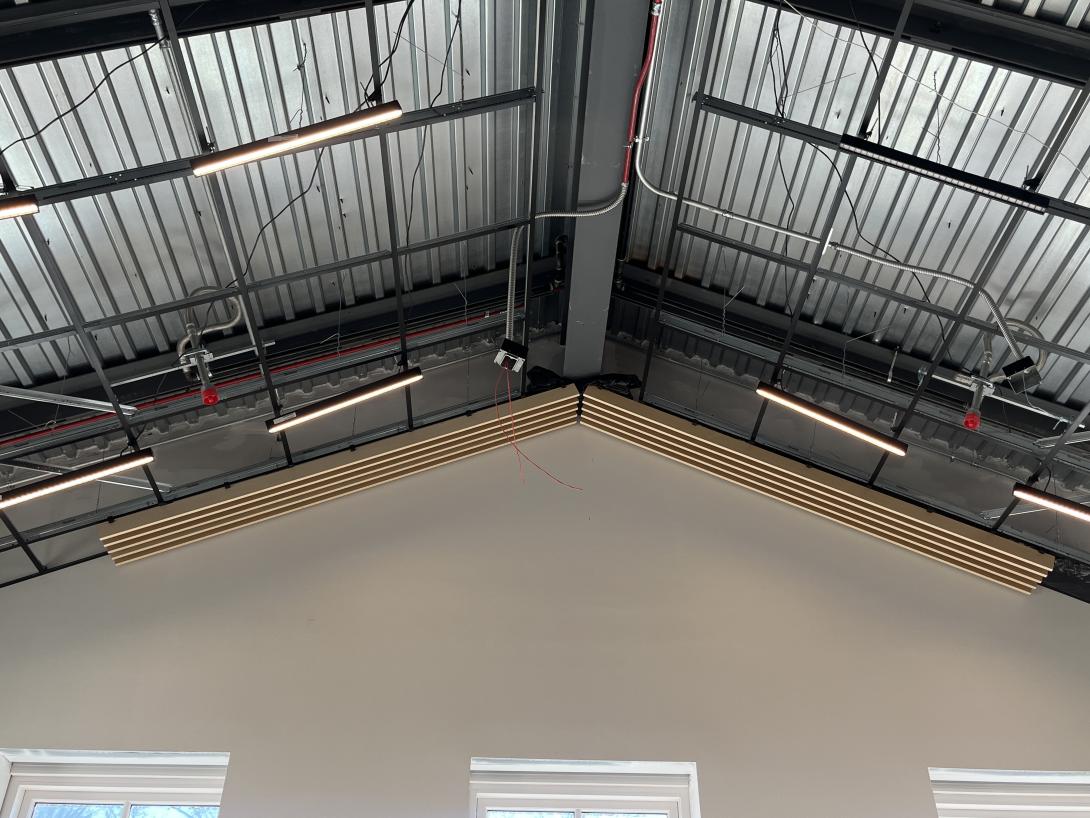 Close-up of ceiling panels and light fixtures installed in new Lobby expansion, February 18, 2026