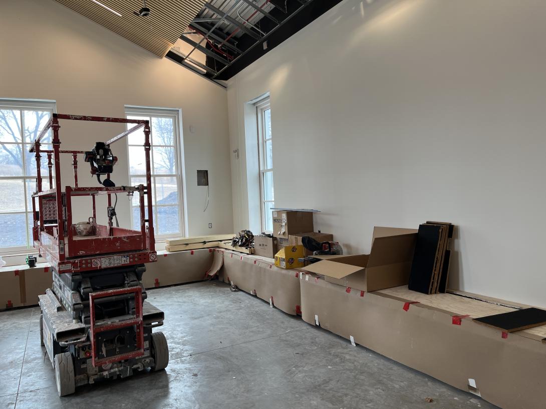Ongoing construction of bench seating in new Lobby expansion, March 4, 2026