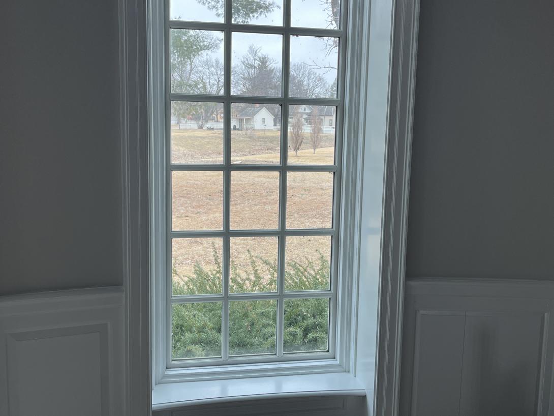 View of Herbert Hoover's birth cottage from the new "From West Branch to the White House" gallery, March 4, 2026