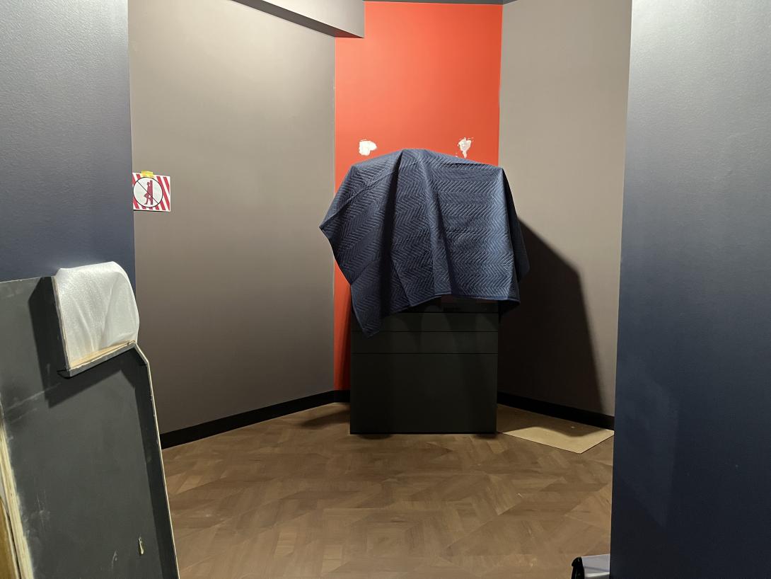 Museum artifact case installed in gallery, March 24, 2026