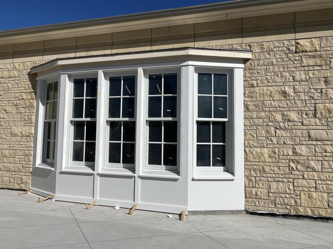 Exterior trim being added to base of the new bay window, April 8, 2026
