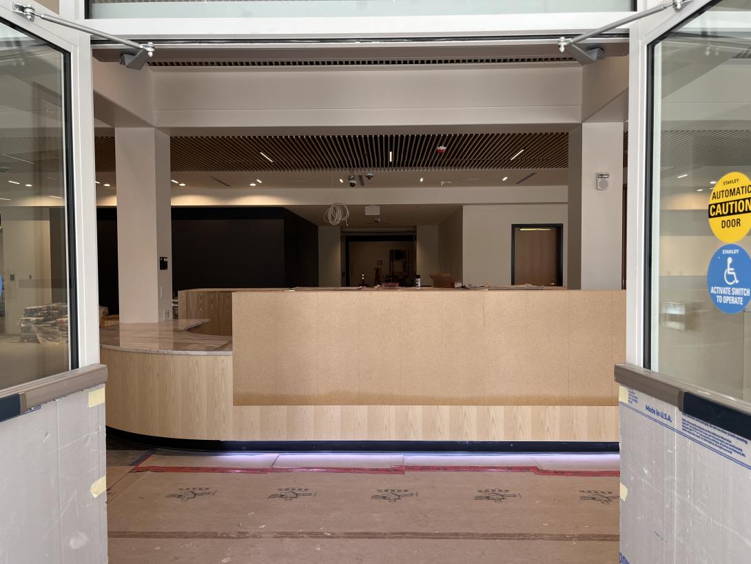 View of reception desk from new front entrance, April 22, 2026