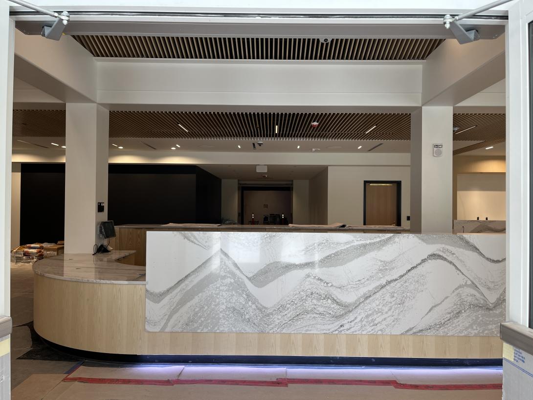View of the new reception desk from the front entry doors, May 6, 2026