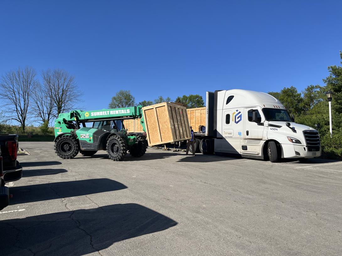 Unloading semi truck with backdrop materials, May 13, 2026