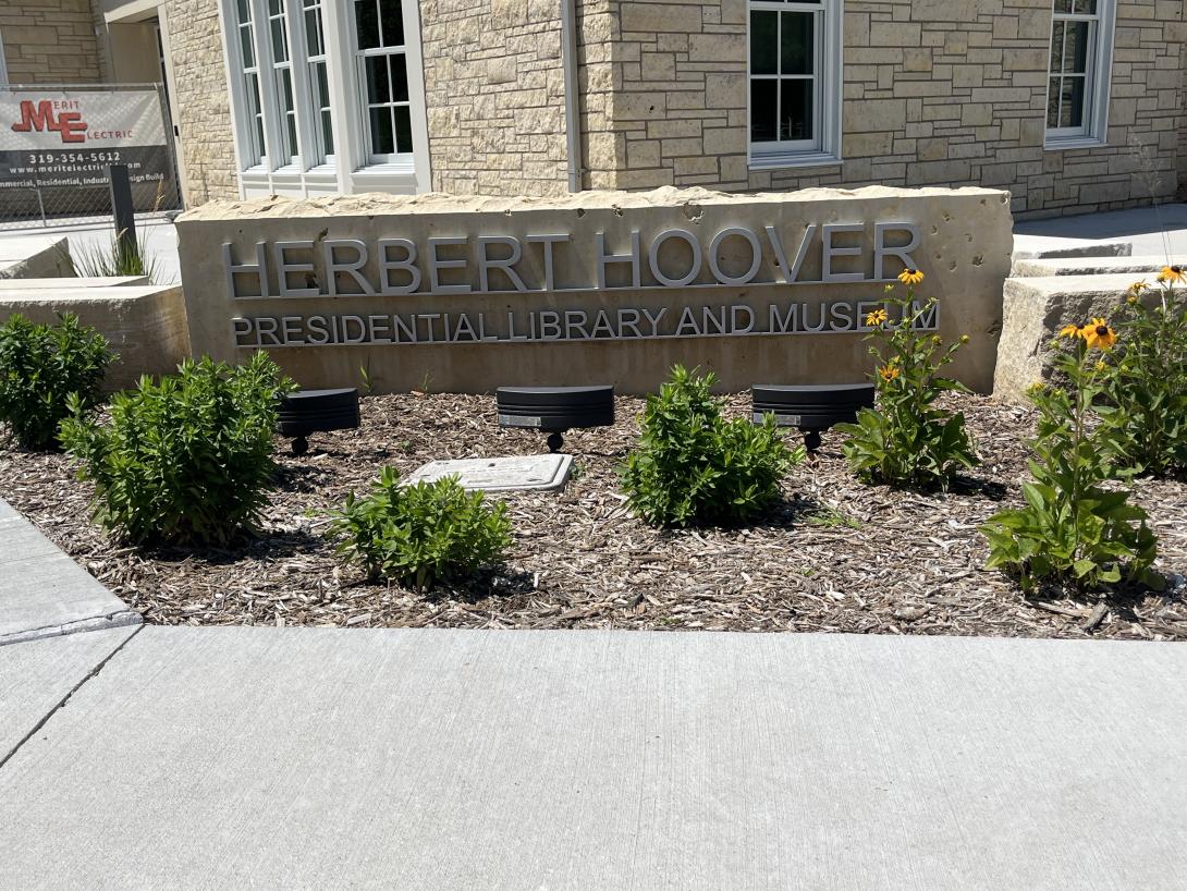 Landscaping around the new Library sign, July 15, 2026