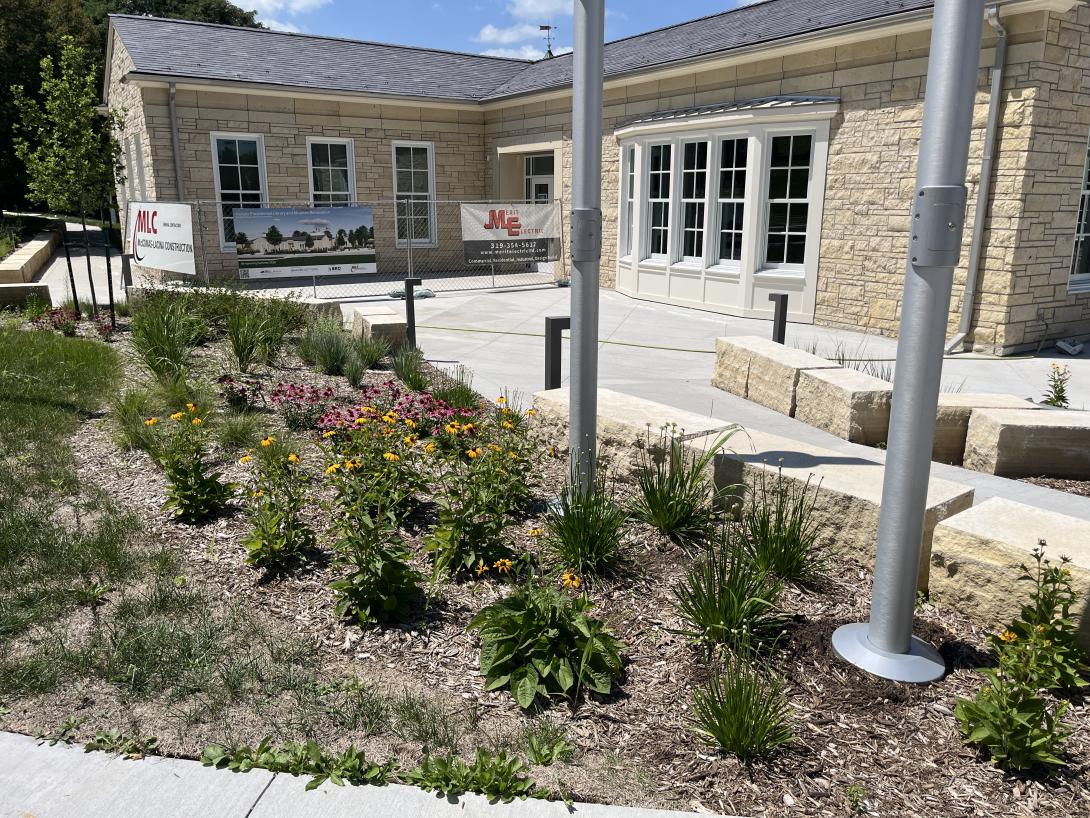 Landscaping around the new Library sign, July 15, 2026