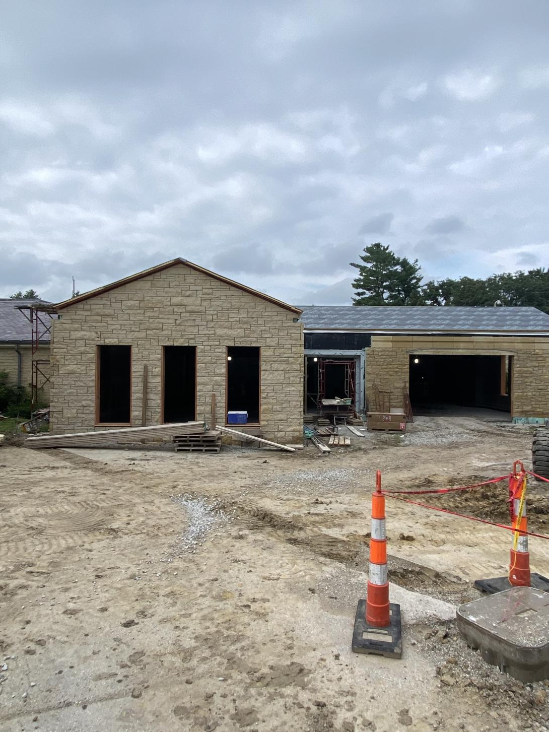Museum exterior showing future windows and front entrance, July 22, 2025
