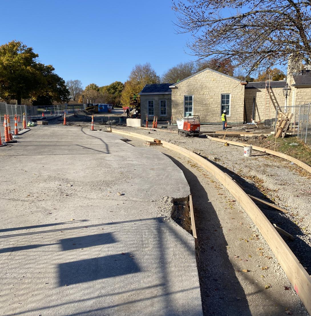Fresh concrete forms curve into pathways to new Museum entrance, November 5, 2025