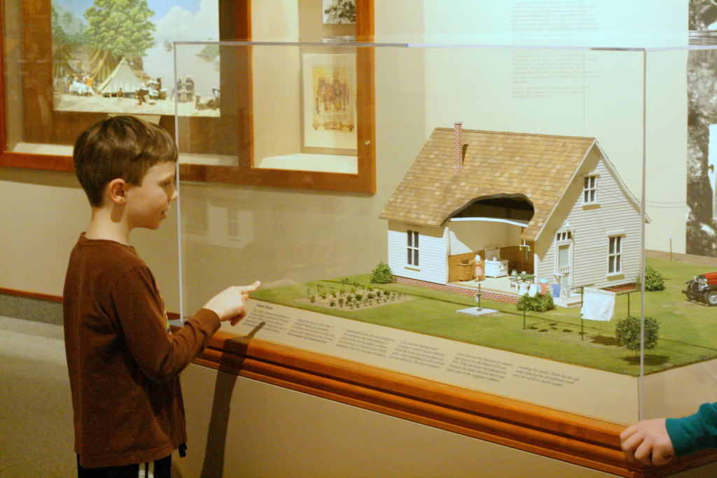 Young child viewing the exhibits at the Herbert Hoover Presidential Library-Museum.