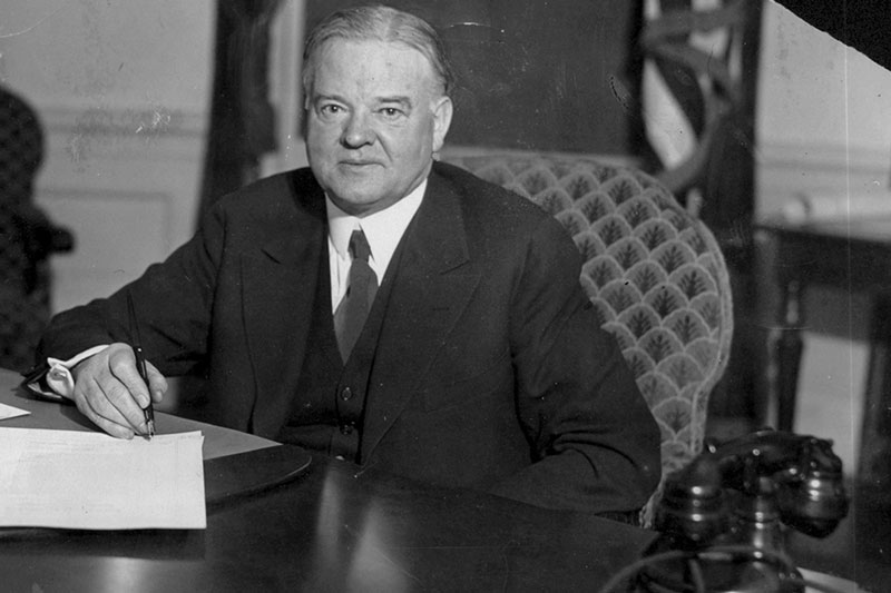 President Herbert Hoover at his desk, 1930.